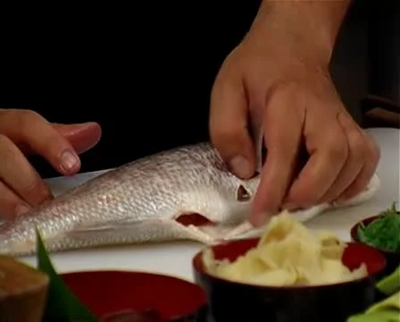 Chef Cleaning and slicing fish Stock-Footage 10610229