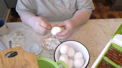 The chef is cleaning a chicken egg. healthy food concept Stock Footage 150258442