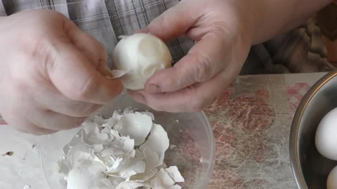 The chef is cleaning a chicken egg. healthy food concept Video stock 167440103