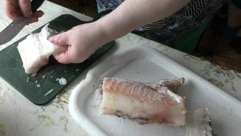 The chef is cleaning the cod fish.  healthy food concept 스톡 동영상 136636599