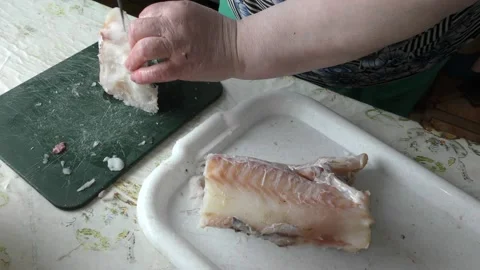 The chef is cleaning the cod fish.  healthy food concept Vídeo Stock 136637063