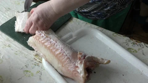 The chef is cleaning the cod fish.  healthy food concept Stock Footage 136637301