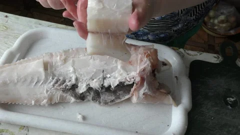 The chef is cleaning the cod fish.  healthy food concept Stock Footage 136637817