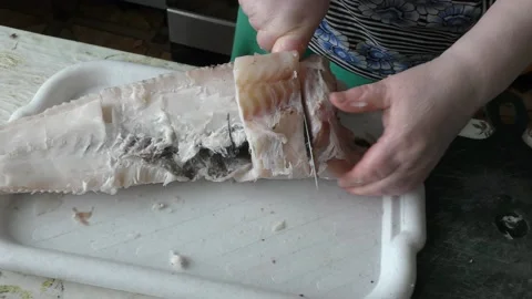 The chef is cleaning the cod fish.  healthy food concept Stock Footage 136637926