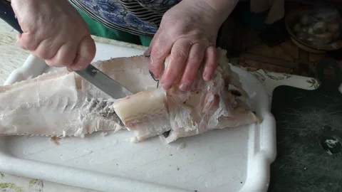 The chef is cleaning the cod fish.  healthy food concept Stock Footage 136637991