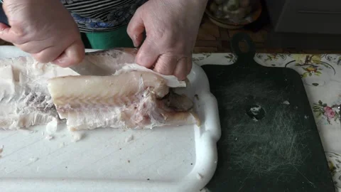 The chef is cleaning the cod fish.  healthy food concept Stock Footage 136638040