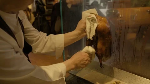 Chef Cleans and Prepares Roasted Poultry in Beijing Restaurant Kitchen, China Stock Footage 345783211