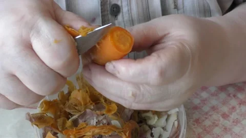The chef cleans with a knife with a special knife Stock Footage 166334905