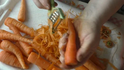 The chef cleans with a knife with a special knife Stock Footage 166335340
