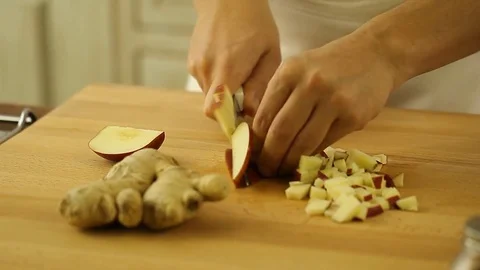 Chef Close Up Hands Slicing Fresh Organic apple Stock Footage 73545213