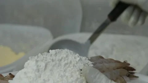 Chef Coating Fresh Shrimp with Flour for Deep Frying Video stock 343028939