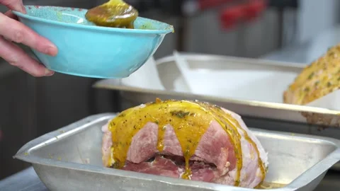 Chef Coating Ham with Marinade in Professional Kitchen Stock-Footage 321366511