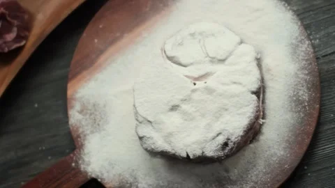 Chef coating raw Osso Buco steak with flour. Top view Video stock 311891868