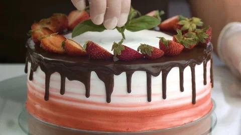 Chef confectioner demonstrates cooked cake. Modern Cake Stock Footage 83017639