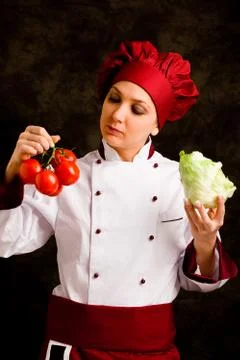 Chef is controlling tomato quality Stock Photos