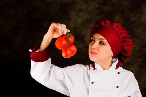 Chef is controlling tomato quality Stock Photos
