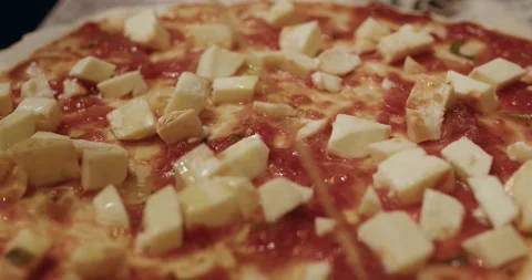 Chef cook adding olive oil on pizza base Stock Footage 221633033