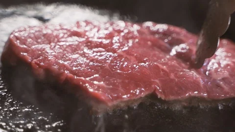 Chef cook a beef fillet in the pan. closeup. Slow motion 스톡 동영상 108351355