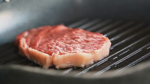 Chef cook a beef fillet in the pan Stock-Footage 108352479
