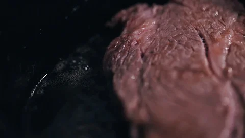 Chef cook a beef fillet in the pan. Fry steak raw meat beef. meat being fried Stock Footage 130074967