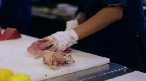 Chef cook cutting knife tuna fish HD video sushi restaurant Japanese cuisine Stock Footage 67487892