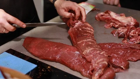 Chef cook explains how to cooking meat Stock Footage 113016557