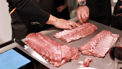 Chef cook explains how to cut meat rib eye for steaks Stock-Footage 113016469