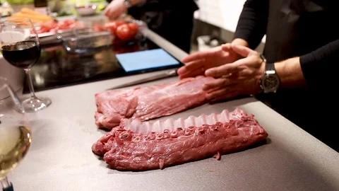 Chef cook explains how to cut meat rib eye for steaks Stock Footage 115286227