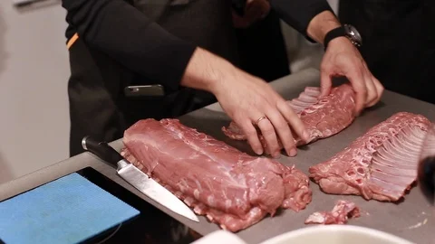 Chef cook explains how to cut meat rib eye for steaks Stock Footage 115286252