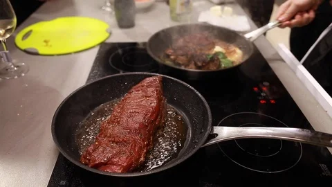 Chef cook fried meat steak in pan Stock-Footage 113016737