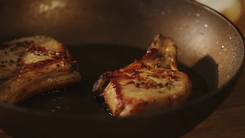 Chef cook fried meat steak in pan Stock Footage 125167865