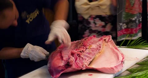 Chef cook hands cutting with knife bluefin tuna fish 4k close up video Stock Footage 67487777