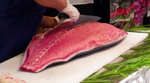 Chef cook hands cutting with knife bluefin tuna fish 4k video. Japanese cuisine Stock Footage 67487829