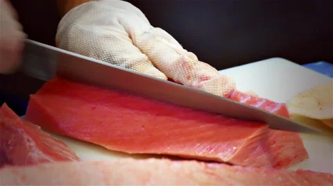 Chef cook hands cutting with knife tuna fish fillet 4k video. Japanese cuisine Stock Footage 67487837