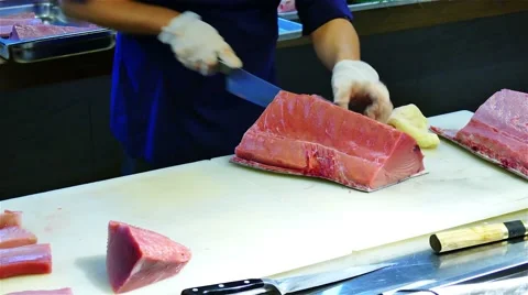 Chef cook hands cutting with knife tuna fish fillet 4k video. Japanese cuisine Stock Footage 67487841