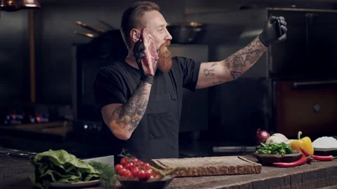 Chef cook making vlog on the smartphone. Talking about meat preparation. Stock Footage 151467836
