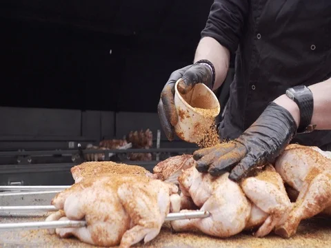 Chef-cook-prepares-grilled-chicken-herbs01 Stock Footage 78610058