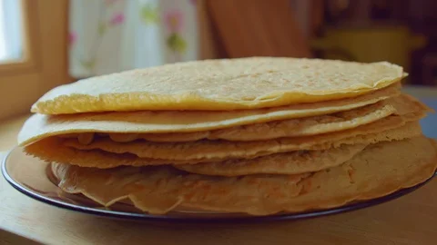 Chef cook put by spatula the steam yummy pancake on stack plate. Slowmo closeup Stock Footage 128701553