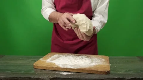 Chef-cooker in chef's hat and apron cooking in bakery Video stock 198734802