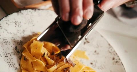 Chef cooking and serving pasta in fine dining restaurant. Stock Footage 178578460
