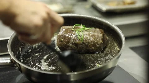 The chef is cooking beef 4 Stock Footage 314977566