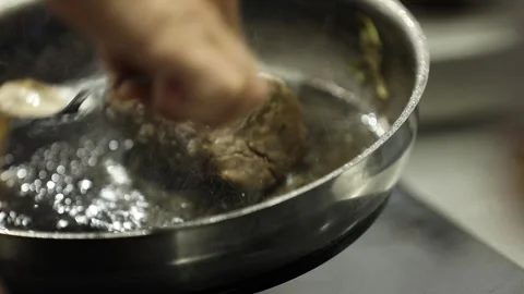 The chef is cooking beef 5 Stock Footage 314977579