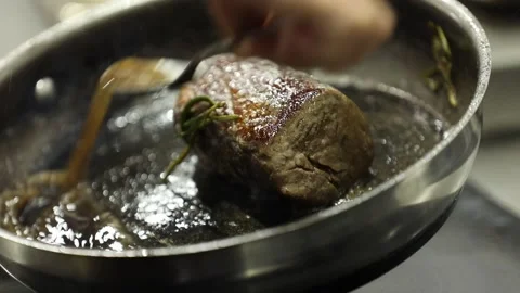 The chef is cooking beef 6 Stock Footage 314977578