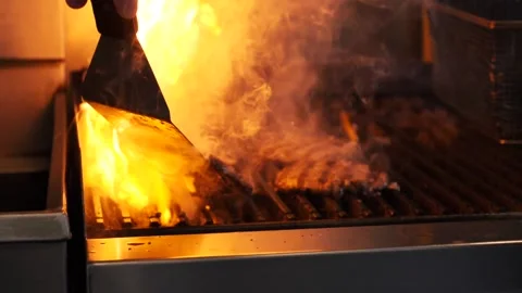 Chef cooking burger patties Stock Footage 201894698