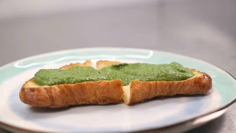 A chef cooking classic eggs benedict with spinach . American breakfast or brunch 스톡 동영상 105494870