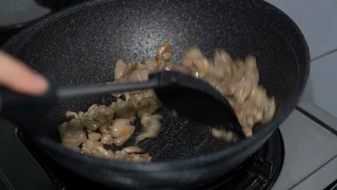 Chef cooking close up grilled sliced chicken in frying pan Stock Footage 91072226