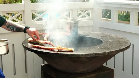The chef is cooking the crab over the fire. Street food.  Stock Footage 282960628
