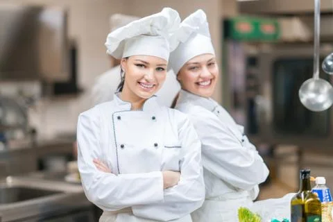 Chef Cooking, Cutting and preparing next plate Stock Photos