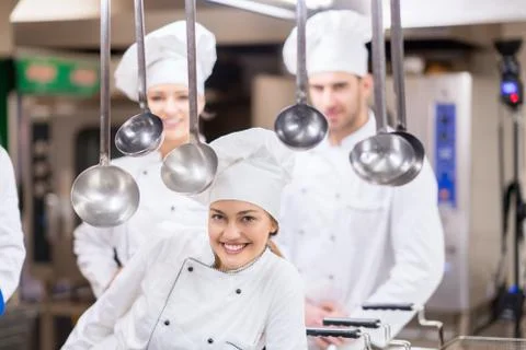 Chef Cooking, Cutting and preparing next plate Stock Photos