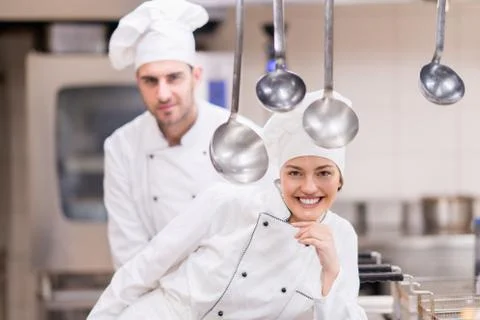 Chef Cooking, Cutting and preparing next plate Stock Photos